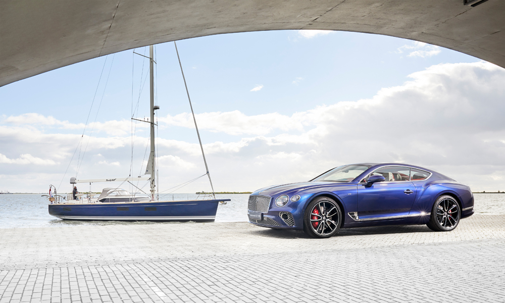 Deep blue hull of the Contest 59CS complements the Light Sapphire exterior paint on the Bentley. Credit: Bentley