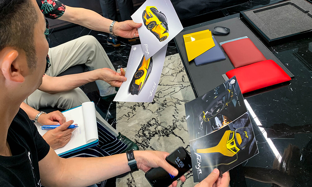 Tetsumi Shinchi and Family looking at the Fenyr Supersport Launch Edition